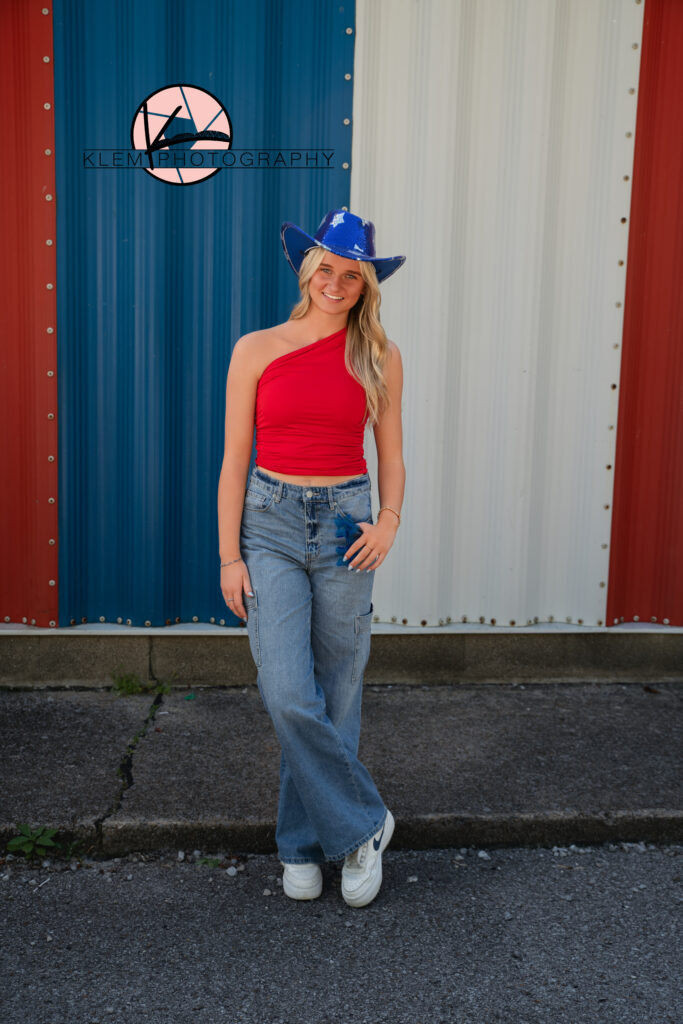 patriotic model team photos by evansville photographers with girl wearing patriotic themed clothing and a blue star hat